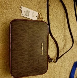 Michael kors crossbody brown and plum purse